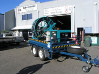 Trailer mounted bore pump reel system